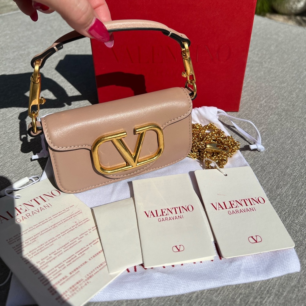 Valentino, leather micro V bag with Crossbody chain and top handle